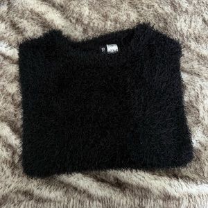Divided Black Fuzzy Sweater